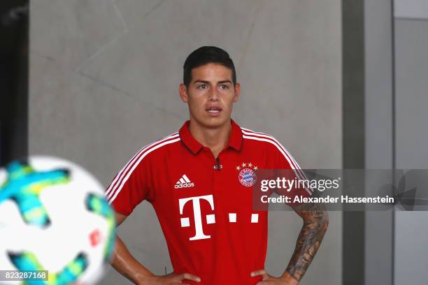 James Rodriguez of FC Bayern Muenchen smiles after performing football skills at JW Marriott Singapore South Beach Hotel during the Audi Summer Tour...