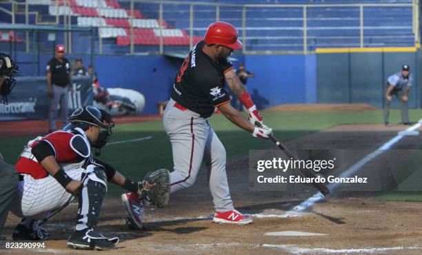 Paul Leon of Piratas de Campeche swigs the ball during the match between Piratas de Campeche and Guerreros de Oaxaca as part of the Liga Mexicana de...