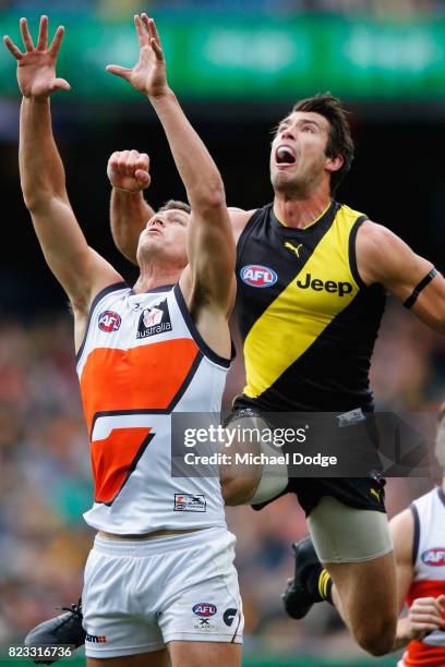 Alex Rance of the Tigers spoils Jonathon Patton of the Giants during the round 18 AFL match between the Richmond Tigers and the Greater Western...