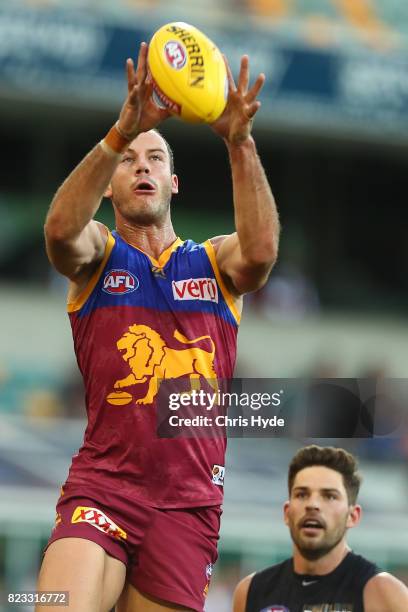 Josh Walker of the Lions takes a mark during the round 18 AFL match between the Brisbane Lions and the Carlton Blues at The Gabba on July 23, 2017 in...