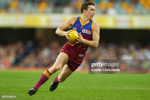 Lewis Taylor of the Lions runs the ball during the round 18 AFL match between the Brisbane Lions and the Carlton Blues at The Gabba on July 23, 2017...