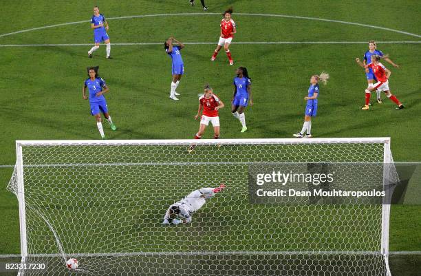 Ana Maria Crnogorcevic of Switzerland heads the opening goal over Sarah Bouhaddi, goalkeeper of France during the Group C match between Switzerland...