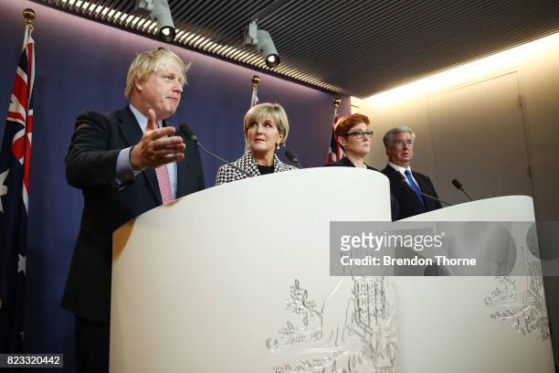 British Foreign Secretary Boris Johnson, Australian Foreign Minister Julie Bishop, Australian Defense Minister Marise Payne and British Defense...