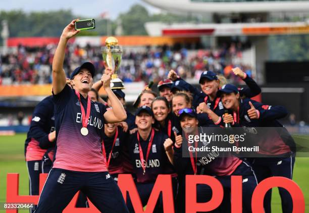 Katherine Brunt of England poses for a selfie with team-mates after winning the ICC Women's World Cup 2017 Final between England and India at Lord's...