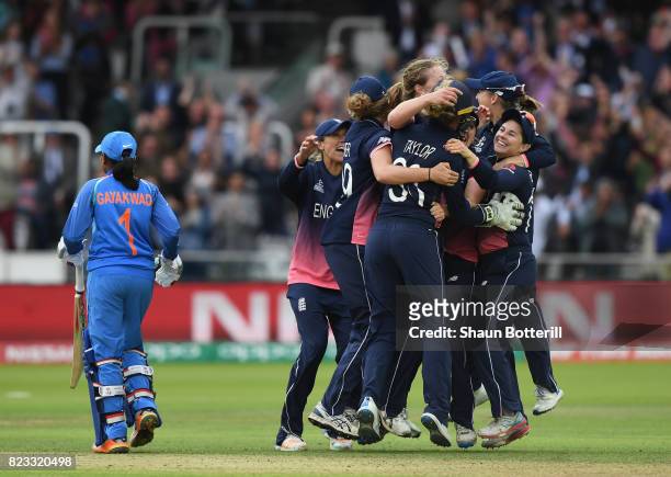 England captain Heather Knight and team-mates celebrate after taking the final India wicket of Rajeshwari Gayakwad to win the ICC Women's World Cup...