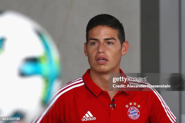 James Rodriguez of FC Bayern Muenchen smiles after performing football skills at JW Marriott Singapore South Beach Hotel during the Audi Summer Tour...
