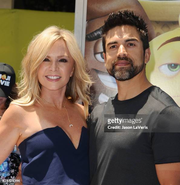 Tamra Judge and husband Eddie Judge attend the premiere of "The Emoji Movie" at Regency Village Theatre on July 23, 2017 in Westwood, California.