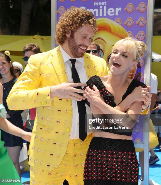 Actor T.J. Miller and actress Anna Faris attend the premiere of "The Emoji Movie" at Regency Village Theatre on July 23, 2017 in Westwood, California.