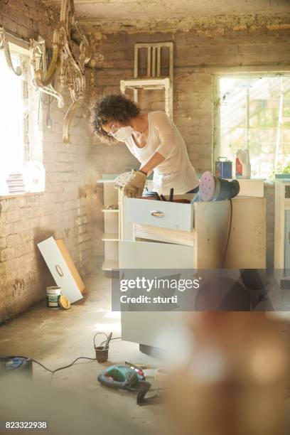 workshop restoration - home sales mask stock pictures, royalty-free photos & images