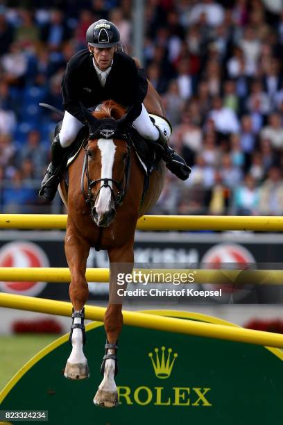 Marcus Ehning of Germany rides on Pret a Tout during the Rolex Grand Prix of CHIO Aachen 2017 at Aachener Soers on July 23, 2017 in Aachen, Germany.
