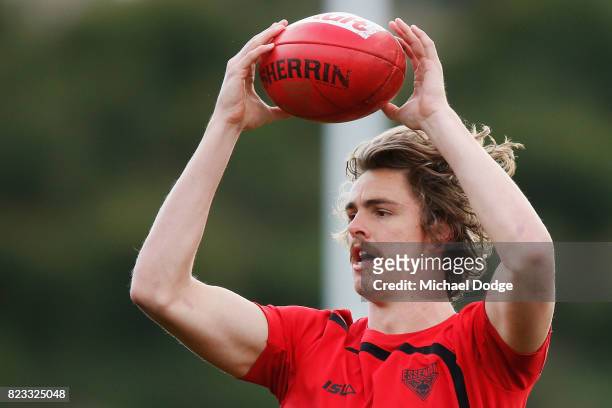 Joe Daniher gathers the ball during an Essendon Bombers AFL media session at the Essendon Football CLub on July 25, 2017 in Melbourne, Australia.