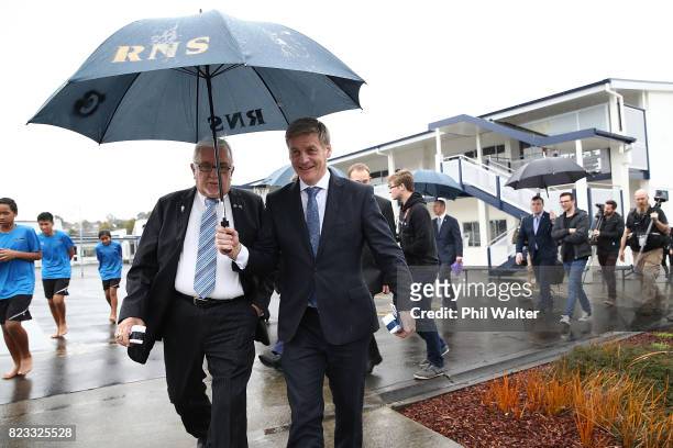 New Zealand Prime Minister Bill English walks with Sir Peter Leitch at Redoubt Primary School during a Rugby League World Cup promotion event on July...