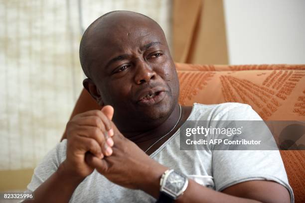 Ghanaian football legend Abedi Ayew, known professionally as Abedi Pele gestures as he speaks about his career at his home in Accra, on July 13,...