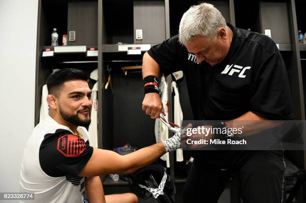 Kelvin Gastelum gets his hands wrapped backstage during the UFC Fight Night event inside the Nassau Veterans Memorial Coliseum on July 22, 2017 in...