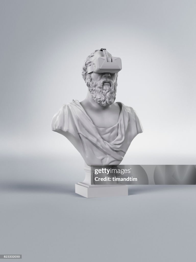 Classic statue of a man wearing a VR headset