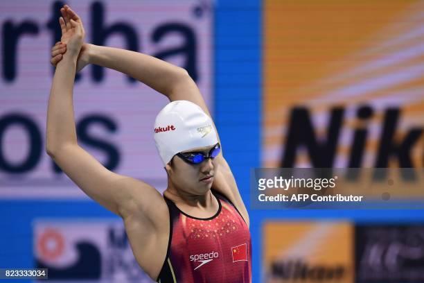 China's Ai Yanhan prepares to compete in a women's 100m freestyle heat during the swimming competition at the 2017 FINA World Championships in...