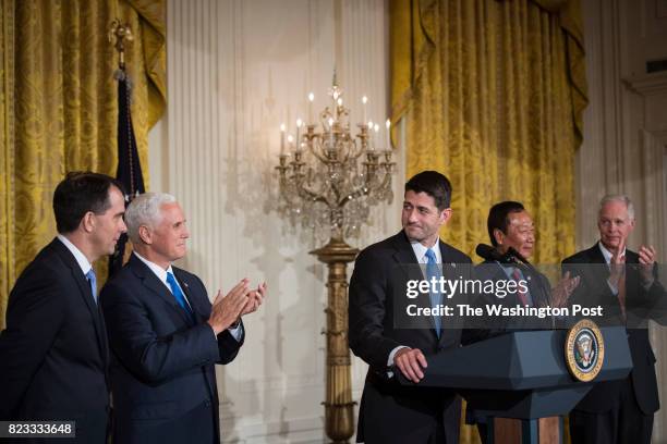 Vice President Mike Pence, Wisconsin Gov. Scott Walker, House Speaker Paul Ryan of Wis., and Terry Gou, president and chief executive officer of...