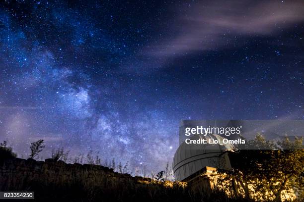 milkyway at night in the forest astrophotography - telescope stock pictures, royalty-free photos & images