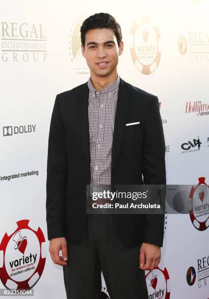 Actor Davi Santos attends the 7th Annual Variety and The Children's Charity Of Southern California's Texas Hold 'Em Poker Tournament at Paramount...