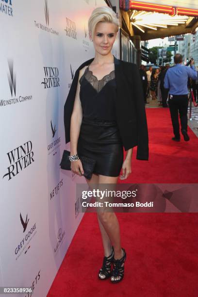 Actress Maggie Grace attends the "Wind River" Los Angeles Premiere presented in partnership with FIJI Water at Ace Hotel Los Angeles on July 26, 2017...