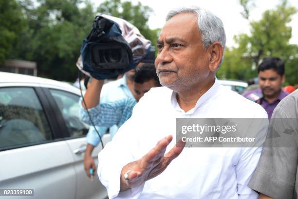 In this picture taken on 25 July 2017, Bihar state Chief Minister Nitish Kumar leaves the Indian parliament after attending the oath-taking ceremony...