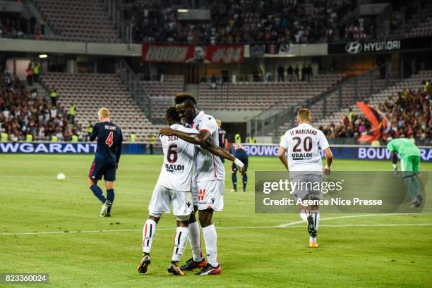 Jean Michael Seri and Mario Balotelli celebrates the goal of Nice during the UEFA Champions League Qualifying match between Nice and Ajax Amsterdam...