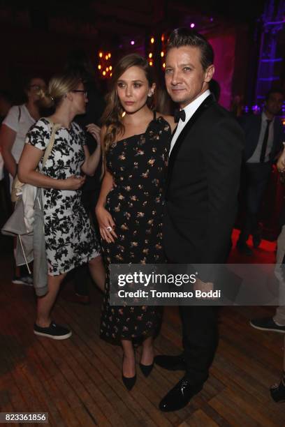 Actors Elizabeth Olsen and Jeremy Renner attend the after party for "Wind River" Los Angeles Premiere presented in partnership with FIJI Water at...