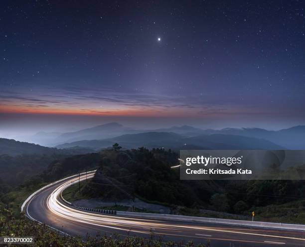 amazing road zodiacal light star night sky - road top view stock pictures, royalty-free photos & images
