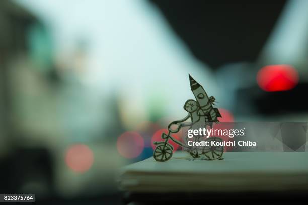 those who carry the rocket - paper craft stock pictures, royalty-free photos & images
