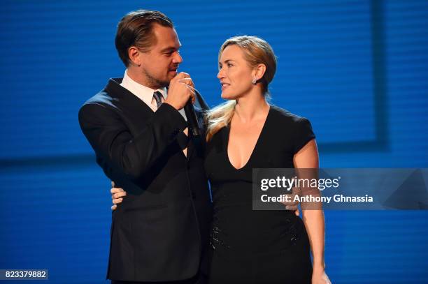 Kate Winslet and Leonardo DiCaprio are seen on stage during the Leonardo DiCaprio Foundation 4th Annual Saint-Tropez Gala at Domaine Bertaud Belieu...