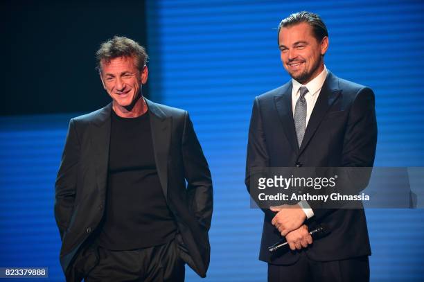 Sean Penn Leonardo DiCaprio are seen on stage the Leonardo DiCaprio Foundation 4th Annual Saint-Tropez Gala at Domaine Bertaud Belieu on July 26,...