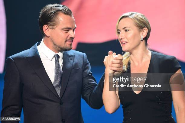 Kate Winslet and Leonardo DiCaprio are seen on stage during the Leonardo DiCaprio Foundation 4th Annual Saint-Tropez Gala at Domaine Bertaud Belieu...