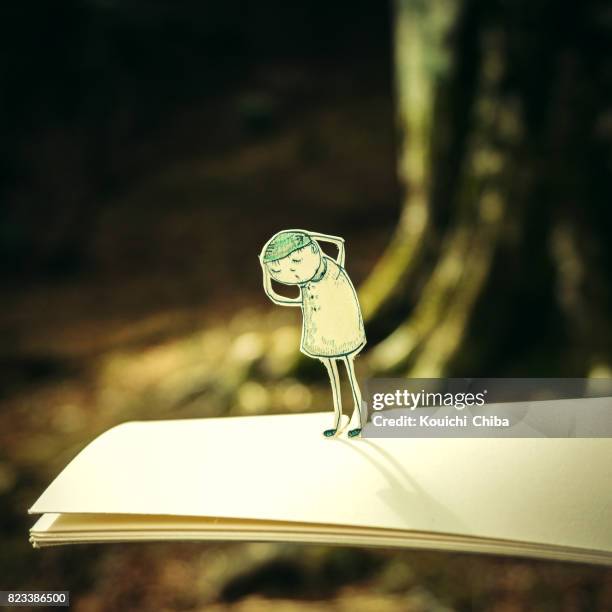 hold the hat - paper doll clothes stock pictures, royalty-free photos & images