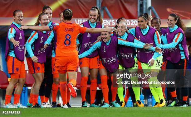 Sherida Spitse of Netherlands celebrate with her team mates after she scores the opening goal by penalty kick during the Group A match between...