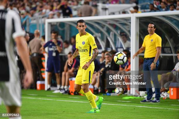 Angel Di Maria of PSG under the watchful eyes of PSG coach Unai Emery during the International Champions Cup match between Paris Saint Germain and...