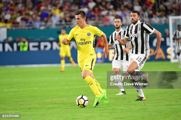 Giovani Lo Celso of PSG and Andrea Barzagli of Juventus during the International Champions Cup match between Paris Saint Germain and Juventus Turin...