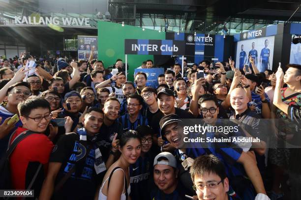 Internazionale legend, Diego Alberto Milito pose for a photograph with fans during the meet the fan session at the ICC Singapore Fan Zone at OCBC...