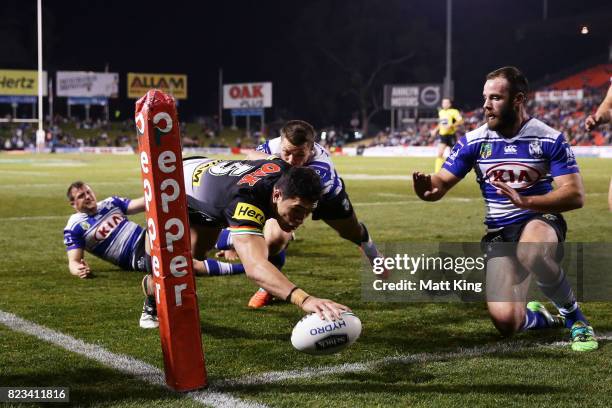 Dallin Watene Zelezniak of the Panthers scores a try in the corner during the round 21 NRL match between the Penrith Panthers and the Canterbury...