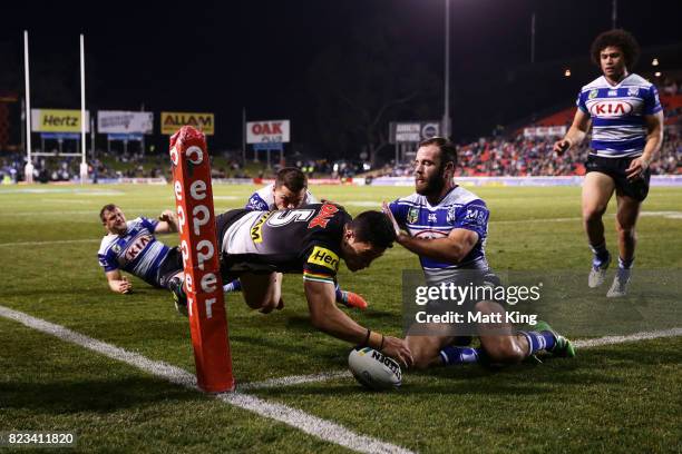 Dallin Watene Zelezniak of the Panthers scores a try in the corner during the round 21 NRL match between the Penrith Panthers and the Canterbury...