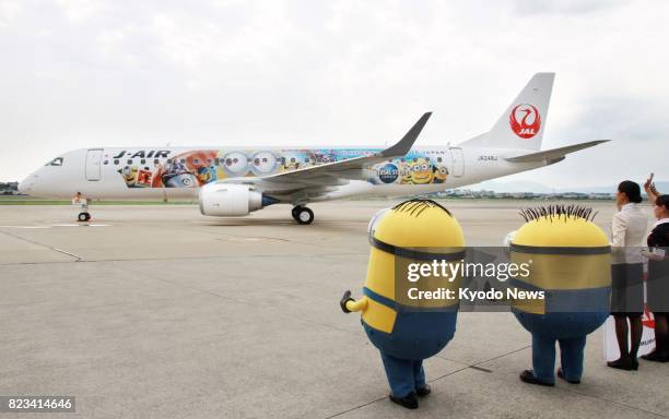 Specially painted Japan Airlines Co. JAL MINION JET promoting a collaboration with Universal Studios Japan and adorned with a character from the...