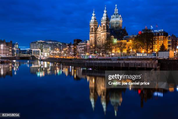 sint-nicolaaskerk, stationsplein, amsterdam, holland - basilica of st nicholas amsterdam stock pictures, royalty-free photos & images