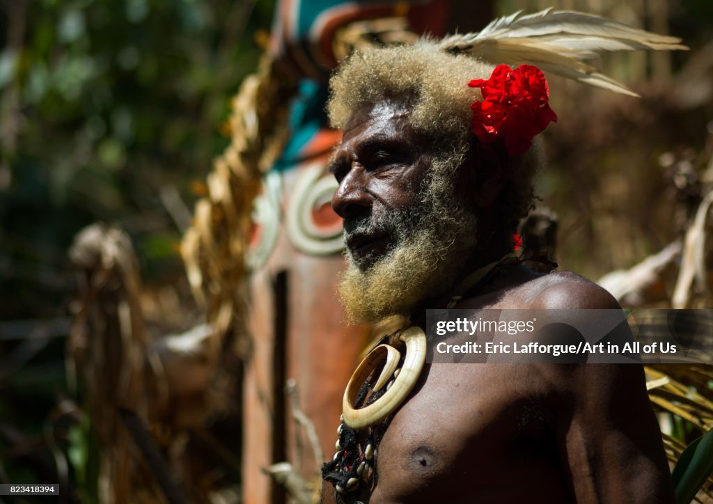Portrait of chieftain Etul in front of a giant slit drum, Ambrym island, Fanla, Vanuatu...