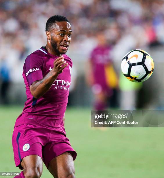Manchester City midfielder Raheem Sterling drives the ball against Real Madrid during the second half of the International Champions Cup match on...