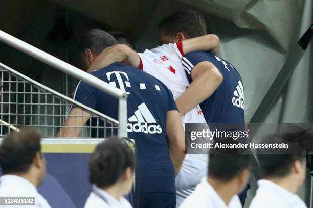 Injured player Franck Ribery of Bayern Muenchen leaves the field of play during the International Champions Cup 2017 match between Bayern Muenchen...