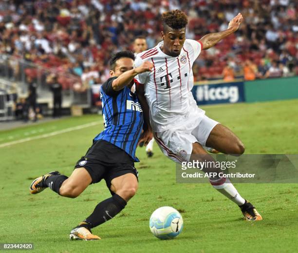 Inter Milan's Yuto Nagatomo fights for the ball with Bayern Munich's Kingsley Coman during their International Champions Cup football match in...