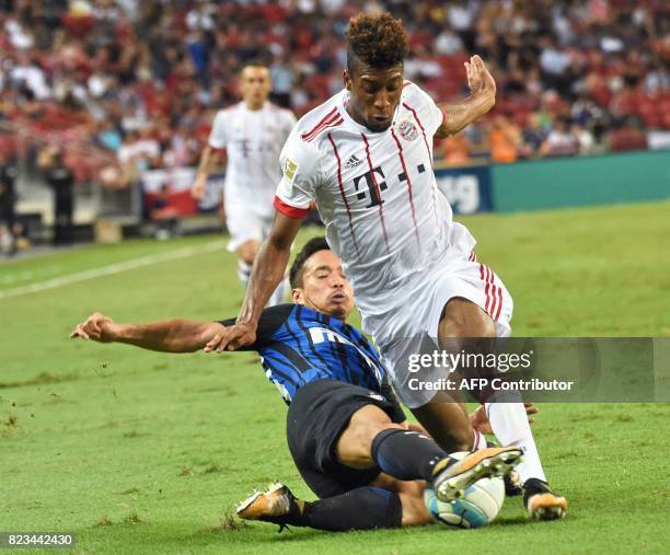 Inter Milan's Yuto Nagatomo fights for the ball with Bayern Munich's Kingsley Coman during their International Champions Cup football match in...