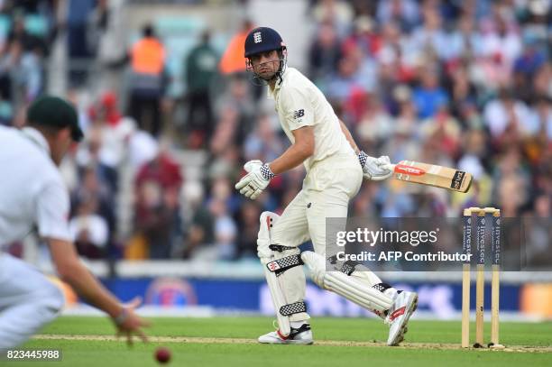 England's Alastair Cook looks on as he escapes being caught out on the first day of the third Test match between England and South Africa at The Oval...