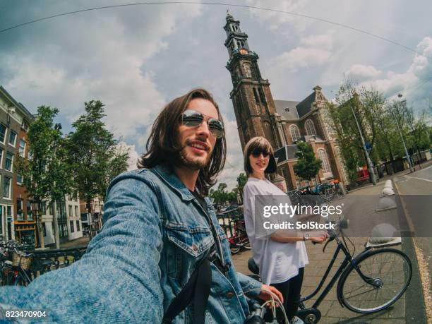 selfie auf urlaub in amsterdam - mirrored sunglasses stock-fotos und bilder