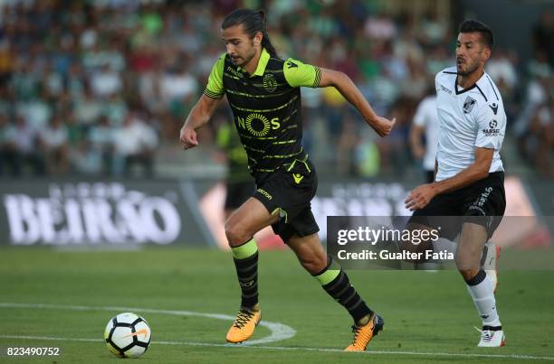 Sporting CP midfielder Matheus Oliveira from Brazil with Vitoria Guimaraes defender Joao Aurelio from Portugal in action during Pre-Season Friendly...