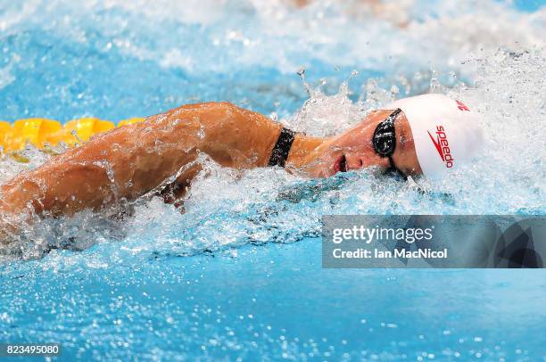 Penny Oleksiak of Canada competes in the heats of the Women's 100m Freestyle on day fourteen of the FINA World Championships at the Duna Arena on...